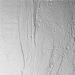 This image captured by NASA's Cassini spacecraft of Saturn's moon Enceladus, shows a region of craters softened by time and torn apart by tectonic stresses.