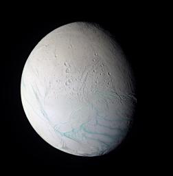 As NASA's Cassini spacecraft approached the intriguing ice world of Enceladus for its extremely close flyby on July 14, 2005, the spacecraft obtained images in several wavelengths that were used to create this false-color composite view.