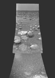 Images from the European Space Agency's Huygens probe descent imager/spectral radiometer side-looking imager and from the medium resolution imager, acquired after landing, were merged to produce this image.
