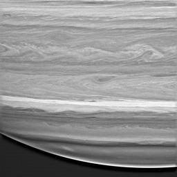 This image captured by NASA's Cassini spacecraft shows a highly detailed look at the feathery, wavelike patterns in the cloud bands of Saturn's southern hemisphere.