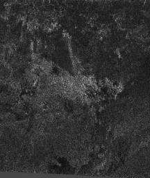 As Cassini scientists work to understand the newly-exposed surface of Saturn's largest moon, Titan, they have found an interesting arrowhead-shaped feature, shown in the center of this synthetic aperture radar image from NASA's Cassini spacecraft.