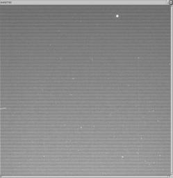 NASA's Cassini spacecraft snapped this image of the European Space Agency's Huygens probe about 12 hours after its release from the orbiter.