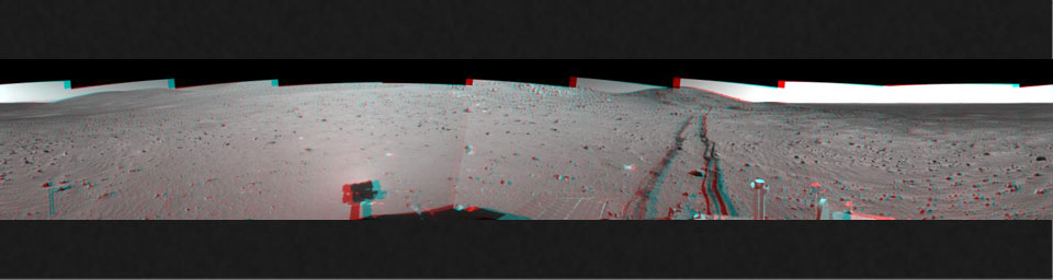 This site, labeled Spirit site 93, is in the 'Columbia Hills' inside Gusev Crater. NASA's Mars Exporation rover Spirit's tracks point westward. 3D glasses are necessary to view this image.