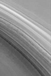 NASA's Mars Global Surveyor shows slopes in the north polar region of Mars exhibiting outcroppings of layered material. Lower layers in the north polar region are thought to include sand.