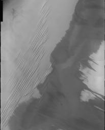 This image is part of THEMIS art month, taken by NASA's Mars Odyssey featuring a portion of Mars' landscape looking like needles in a haystack (without the haystack).