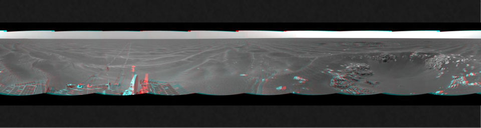 On Feb. 24, 2005, NASA's Mars Exploration Rover Opportunity had driven about 73 meters (240 feet) and reached the eastern edge of a small crater dubbed 'Naturaliste,' 3D glasses are necessary to view this image.