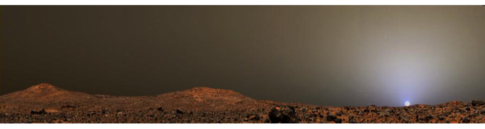 This illustration is a composite that creatively combines two previously released images from NASA's Mars Pathfinder for a sunset scene in Ares Valles in July 1997.