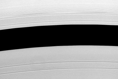 This image captured by NASA's Cassini spacecraft shows Saturn's Encke Gap (325 kilometers, or 200 miles wide) whose center is 133,590 kilometers (83,010 miles) from Saturn. This division in the rings is home to the small moon called Pan.