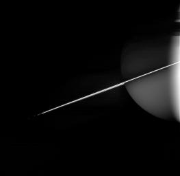 Like a rope of brilliant neon, Saturn's rings outshine everything else in this night side view from NASA's Cassini spacecraft, while the sunlit southern face of the rings reflects a dim glow onto the atmosphere below.