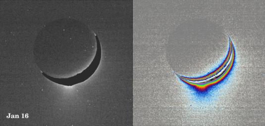 A fine spray of small, icy particles emanating from the warm, geologically unique province surrounding the south pole of Saturn's moon Enceladus was observed in NASA's Cassini narrow-angle camera image of the crescent moon taken on Jan. 16, 2005.