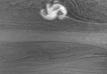 This image NASA's Cassini spacecraft shows a rare and powerful storm on the night side of Saturn.