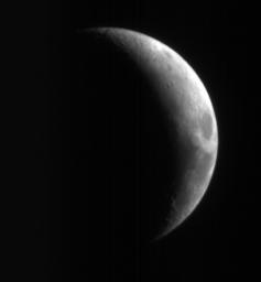 This crescent view of Earth's Moon in infrared, blue-green, and red wavelengths comes from a camera test by NASA's Mars Reconnaissance Orbiter spacecraft on its way to Mars.