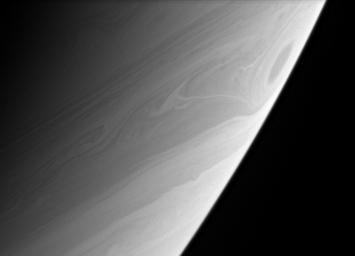 A great vortex rolls through high southern latitudes on Saturn, whirling twisted contours into the clouds. This image was taken with NASA's Cassini spacecraft's narrow-angle camera at a distance of approximately 2.8 million kilometers from Saturn.