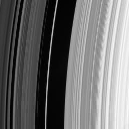 The sharp outer boundary of Saturn's B ring, which is the bright ring region seen to the right in this image, is maintained by a strong resonance with the moon Mimas as seen by NASA's Cassini spacecraft.