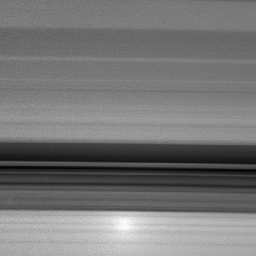 A brilliant spot of sunlight, the opposition effect, travels outward across the rings as NASA's Cassini spacecraft orbits Saturn. This surge in ring brightness is created around the point directly opposite the Sun from the spacecraft.