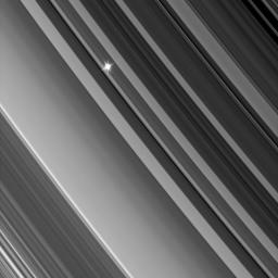 NASA's Cassini spacecraft looks through the dense B ring toward a distant star in an image from a recent stellar occultation observation.