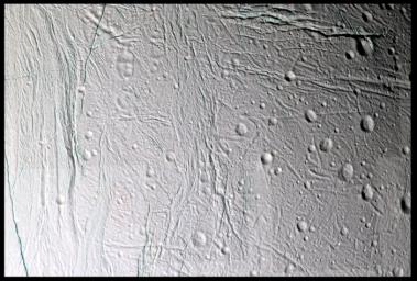 Fine topographic detail and color variations are revealed in this 11-image, false color mosaic taken during NASA's Cassini's second close flyby of Saturn's moon Enceladus, on March 9, 2005.