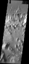 The landslides in this image are located in Aurorae Chaos on Mars as seen by NASA's 2001 Mars Odyssey spacecraft.