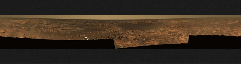 This 360-degree view taken in August, 2006, shows Opportunity's last stop on surface of Meridiani Planum. At center of the mosaic is 'Beagle Crater,' an impact crater. Opportunity's tracks are visible approaching the crater.