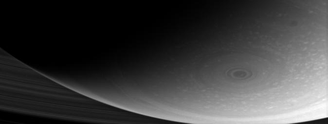 This dramatic close-up of Saturn's south pole shows the hurricane-like vortex that resides there. The entire polar region is dotted with bright clouds, including one that appears to be inside the central ring of the polar storm as seen by NASA's Cassini.