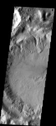 This image shows slope streaks on a small hill on Mars. The hill is near an unnamed crater at the south end of Phlegra Montes as seen by NASA's 2001 Mars Odyssey spacecraft.