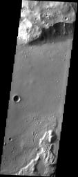 This image shows a small landslide on the northern margin of Tiu Vallis on Mar as seen by NASA's 2001 Mars Odyssey spacecraft.