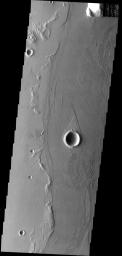 The teardrop-shaped 'island' in this image was formed by the flow of fluid lava rather than liquid water on Mars as seen by NASA's Mars Odyssey spacecraft.