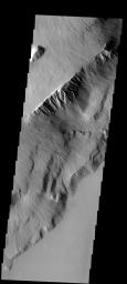 This spectacular image shows part of the escarpment of the Olympus Mons volcano on Mars as seen by NASA's Mars Odyssey spacecraft.