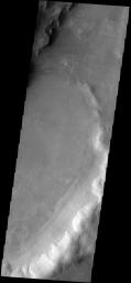 This image from NASA's Mars Odyssey spacecraft shows large, dark sand dunes on Mars. These dunes are on the floor of Kaiser Crater.