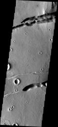 This image from NASA's Mars Odyssey spacecraft shows fractures at the top of this image of part of Mangala Fossae. The fractures in the lower half are part of the Memnonia Fossae system.