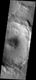 This image from NASA's Mars Odyssey spacecraft shows an unnamed central peak crater east of Hadriaca Patera on Mars. The crater rim is cut by multiple channels and part of the rim has failed.