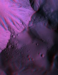 This anaglyph from NASA's Mars Reconnaissance Orbiter spacecraft, shows Olympus Mons, the largest volcano in the Solar System. Constructed of lava flows, many aspects of this titanic volcano remain puzzling. 3D glasses are necessary to view this image.