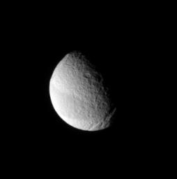 This view of Saturn's moon Tethys displays three of the moon's most notable surface features. This image was taken in visible light with NASA's Cassini spacecraft's narrow-angle camera on Jan. 14, 2008.