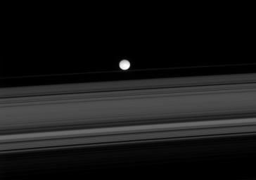 On Dec. 2, 1007, NASA's Cassini spacecraft spied two of Saturn's small moons, Atlas and Epimetheus, that skirt the edges of the planet's rings.