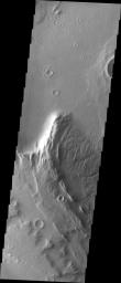 This image from NASA's Mars Odyssey spacecraft shows part of the summit caldera of Apollinaris Patera, an old volcano on Mars that has undergone extensive erosion. 