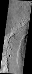 This image from NASA's Mars Odyssey spacecraft shows northwestern edge of the summit caldera of Apollinaris Patera, an old volcano on Mars that has undergone extensive erosion. 