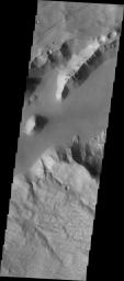 This image from NASA's Mars Odyssey spacecraft shows a portion one a graben where it intersects a crater in Sirenum Fossae on Mars. Several landslides are evident.