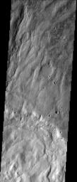 This image from NASA's Mars Odyssey spacecraft shows drainage channels from the highland of Claritas Fossae toward the lowlands of Icaria Planum.