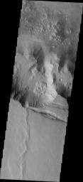 This image from NASA's Mars Odyssey spacecraft shows interesting landslide is located on the southern wall of Melas Chasma.