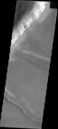 This image from NASA's Mars Odyssey spacecraft shows landslides along the eastern cliff of one of the many graben that make up Noctis Labyrinthus.