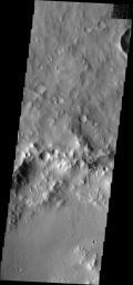 This image from NASA's Mars Odyssey shows a landslide deposit on the northern rim of Montevallo Crater on Mars.