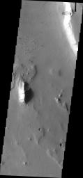 This image from NASA's Mars Odyssey shows a small landslide located in the Chryse Chaos/ Tiu Valles region, one on the many outflow channels that empty into Chryse Plainitia.