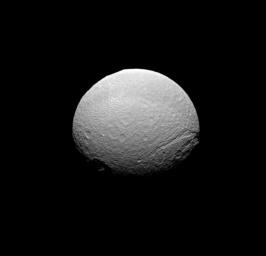 NASA's Cassini spacecraft takes in a southern view of the scarred face of Saturn's icy moon Tethys. 
