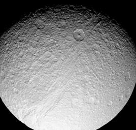 Powerful forces ripped apart the surface of Saturn's moon Tethys at some time in the deep past, creating the incredible canyon system of Ithaca Chasma. This image was captured by NASA's Cassini spacecraft on July 28, 2008.