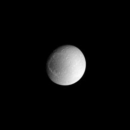 Dione's dark trailing hemisphere (toward the left) and bright leading hemisphere are both visible in this view centered on the moon's anti-Saturn facing side. This image was taken in visible light with NASA's Cassini spacecraft's narrow-angle camera.