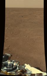 This approximate color view was obtained on sol 2 by the Surface Stereo Imager (SSI) on board NASA's Mars Phoenix lander. The view is toward the northwest, showing polygonal terrain near the lander and out to the horizon.
