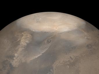 NASA's Mars Global Surveyor shows choppy dust clouds of at least three dust storms on Mars. The white polar cap is frozen carbon dioxide.