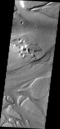 This image from NASA's Mars Odyssey shows a complex region of channels, part of Kasei Valles, one of the large outflow channels on Mars.