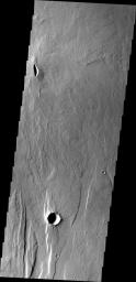 This image from NASA's Mars Odyssey is south of Alba patera. This volcanic vent is the source of the lava flows surrounding it.