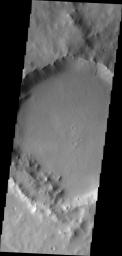 This image from NASA's Mars Odyssey shows dark slope streak marking the interior of the rim of this unnamed crater in Terra Sabaea.